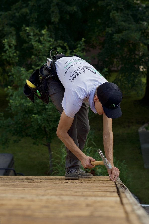 A-Team Exteriors roofing crew installing a new roof near Wahpeton, ND