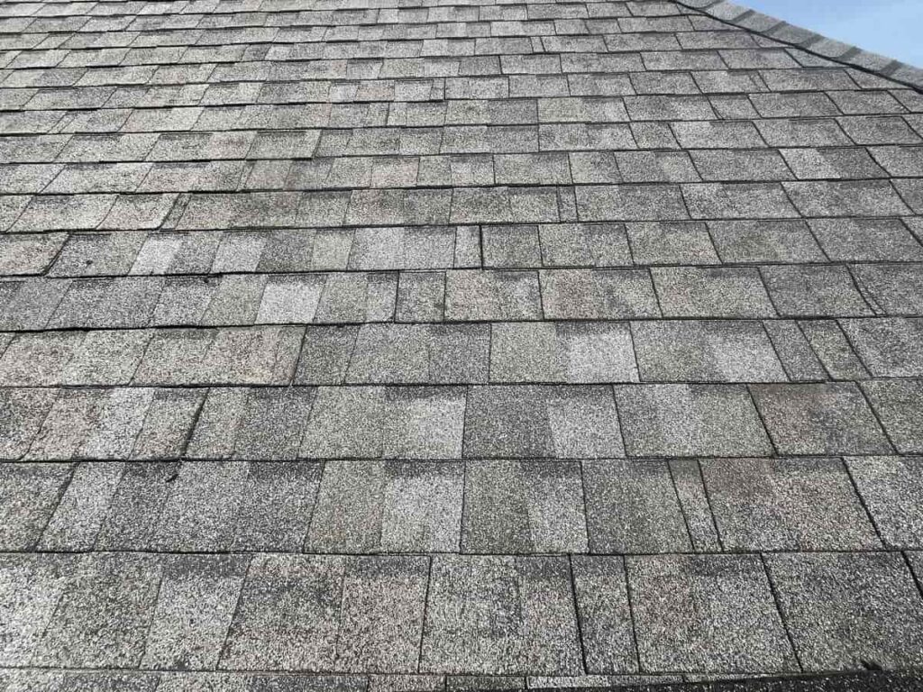 Damaged shingle and flashing repair on a Wahpeton, ND home