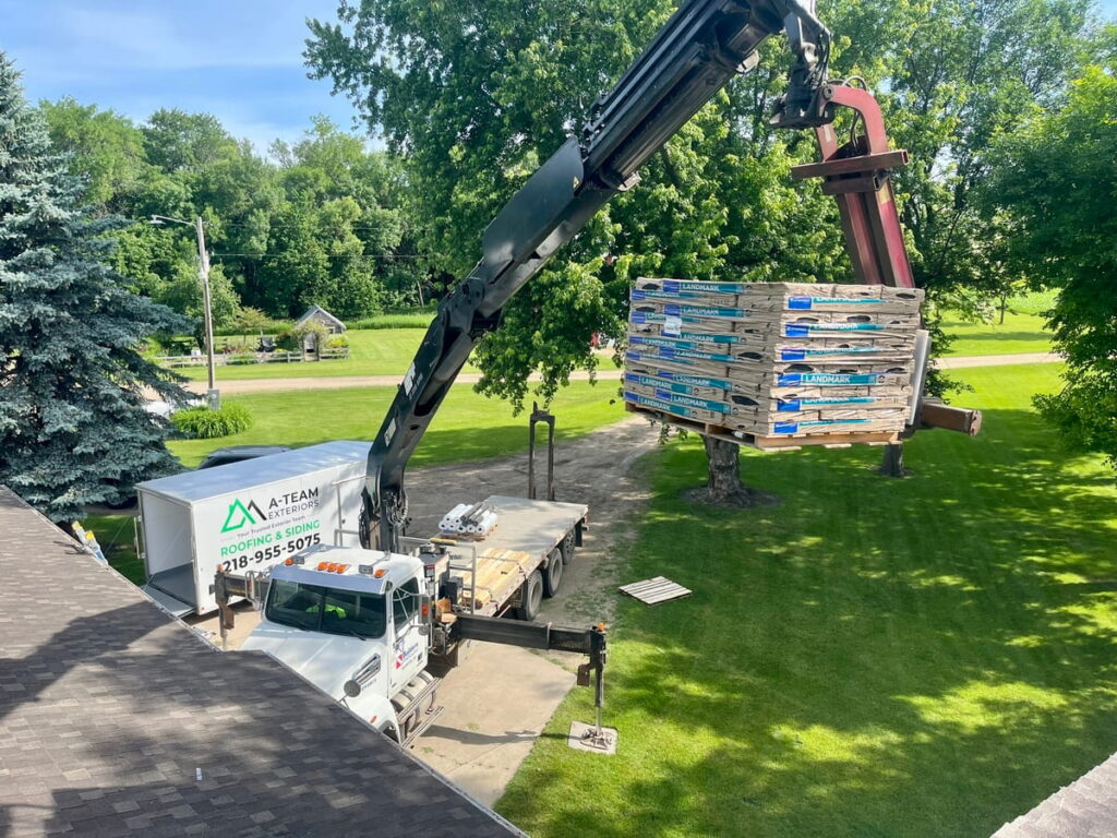 Storm-damaged roof being repaired in the Breckenridge-Wahpeton area